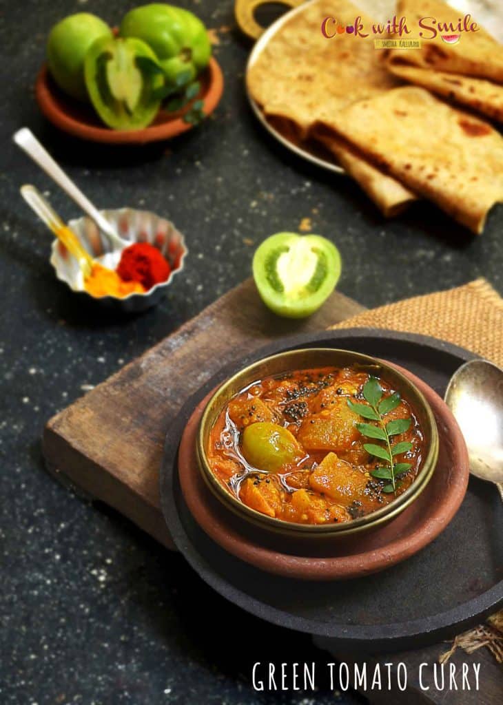 Green Tomato Curry / Kayi Tomato Gojju is an easy and tasty side dish with a perfect blend of spiciness , tartness and a tinge of sweetness